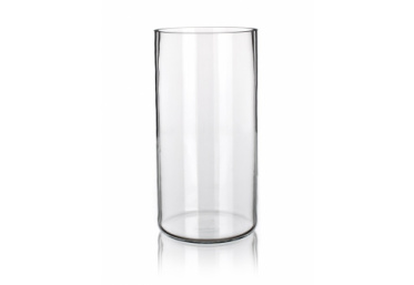 A clear, tall cylindrical glass vase with a smooth surface and an open top. The glass is transparent and reflects light lightly, casting subtle reflections on the surface it stands on. The background is plain white.