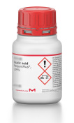 Merck brand oxalic acid lab glass with information and product identifiers on it