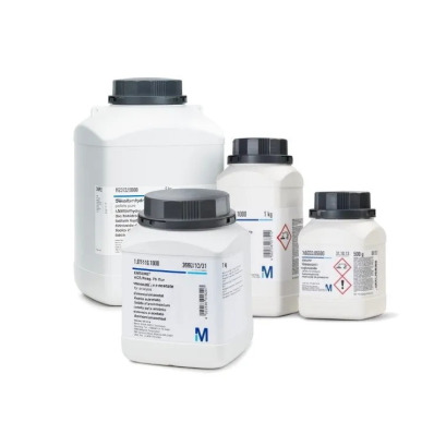 Merck Sodium Hydroxide in white cans with black lids and technical specifications labels in white and blue