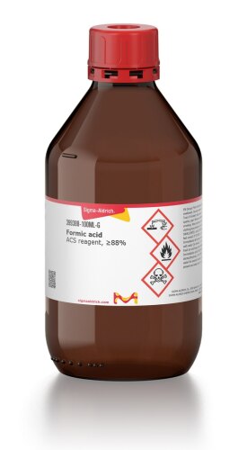 Sigma-Aldrich brand laboratory formic acid, which is in a brown laboratory bottle with a clearly technical label