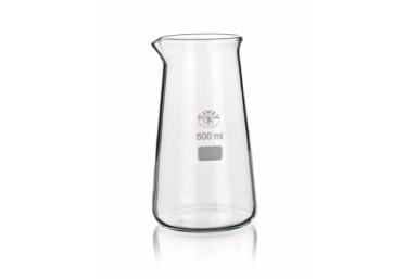 A transparent 500 ml glass measuring beaker with a spout. The beaker has a wide base that tapers towards the top and is marked with the volume measurement 