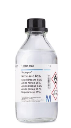 Merck's laboratory nitric acid in a clear glass bottle with a technical specification label