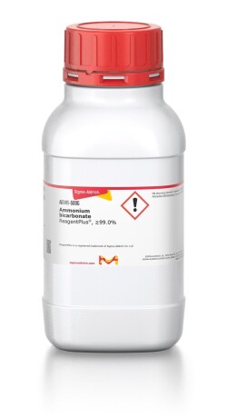 Sigma-Aldrich brand ammonium bicarbonate in a white bottle with a red lid and a label of product specifications printed in white, red and black.